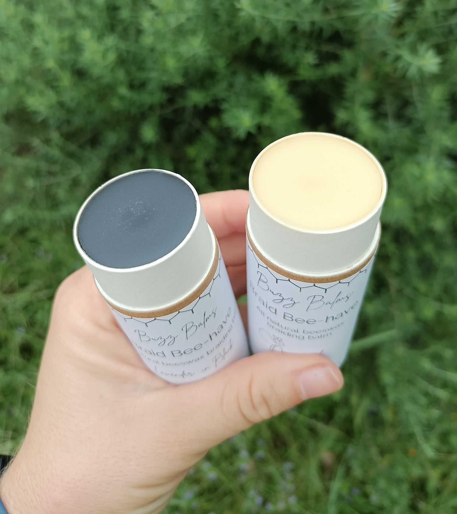 Buzz Balms Braid Bee-have mane braiding beeswax balm in black and clear